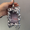 Non-attribute electroplated silver shaped card holder
