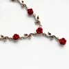 Ensemble de bijoux &eacute;l&eacute;gant avec collier et boucles d'oreilles en forme de fleur de rose