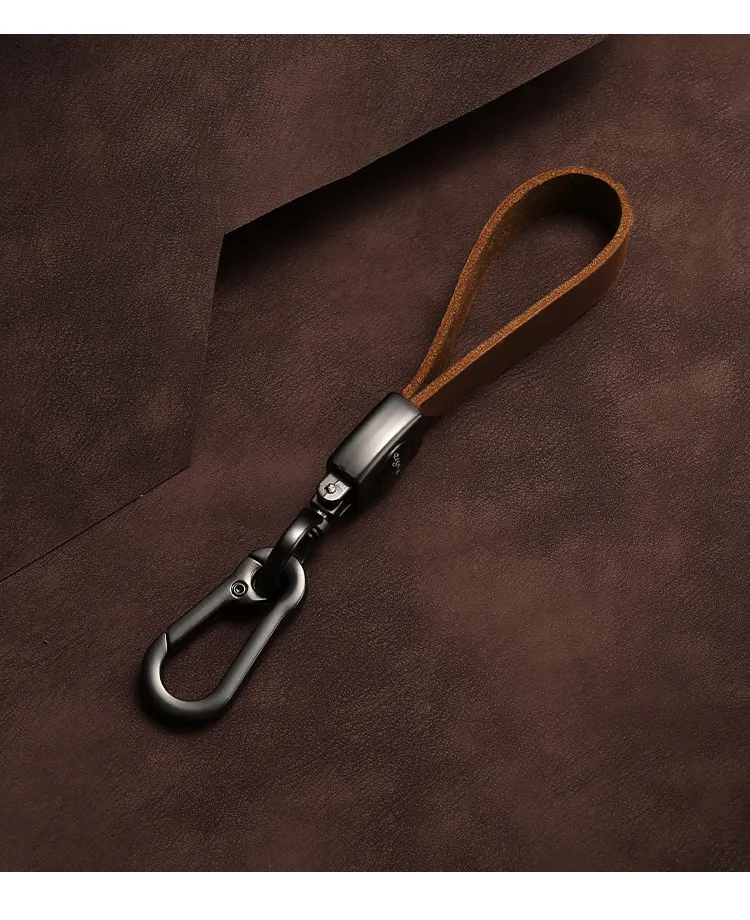 🔥Hot sale🔥Exclusive logo🔥Car anti-lost genuine leather alloy keychain