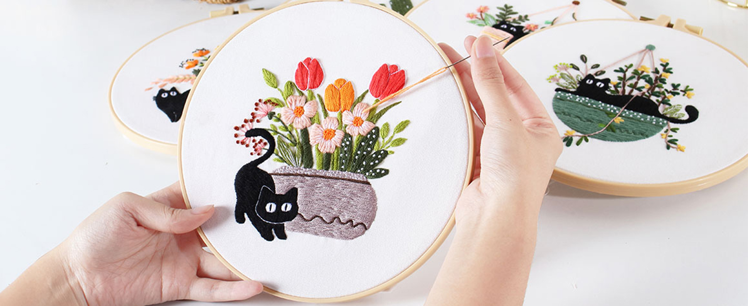 DIY cat embroidery kit featuring black cats in plant pots