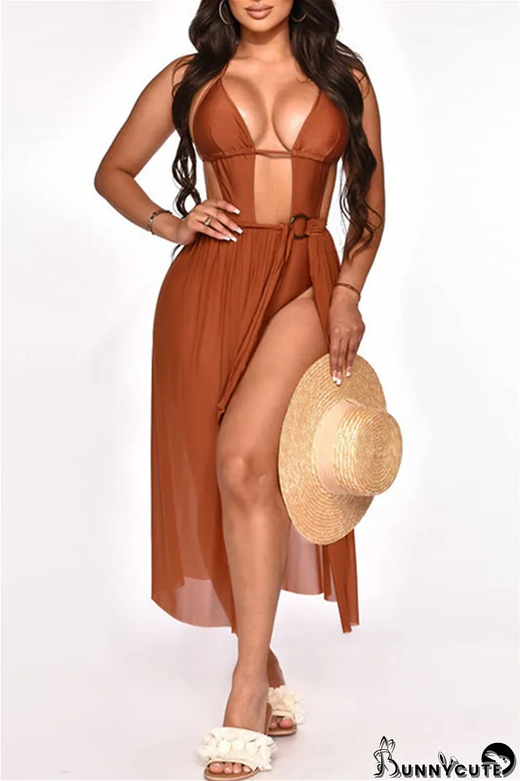 Khaki Sexy Solid Bandage Hollowed Out Patchwork Backless Halter Beach Dress