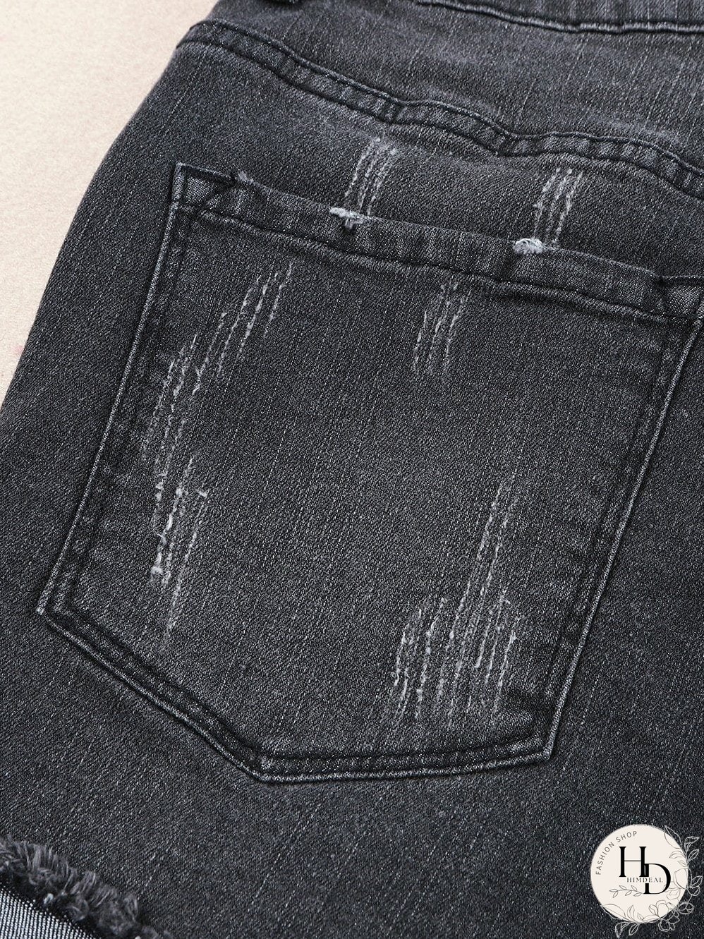Vintage Chic Distressed Black Denim Shorts with Roll Hem