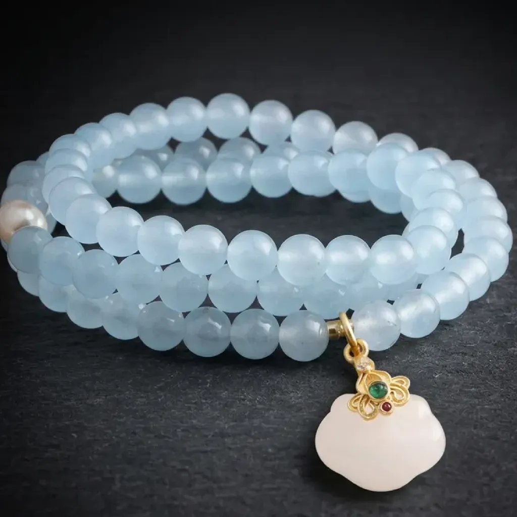 Celestial Serenity: Aquamarine & Pearl Triple Strand Charm Bracelet Celestial Cloud & Ruyi Charm