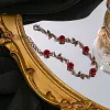 Ensemble de bijoux &eacute;l&eacute;gant avec collier et boucles d'oreilles en forme de fleur de rose