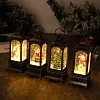 Christmas glowing interior water-filled wind lantern