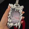 Non-attribute electroplated silver shaped card holder