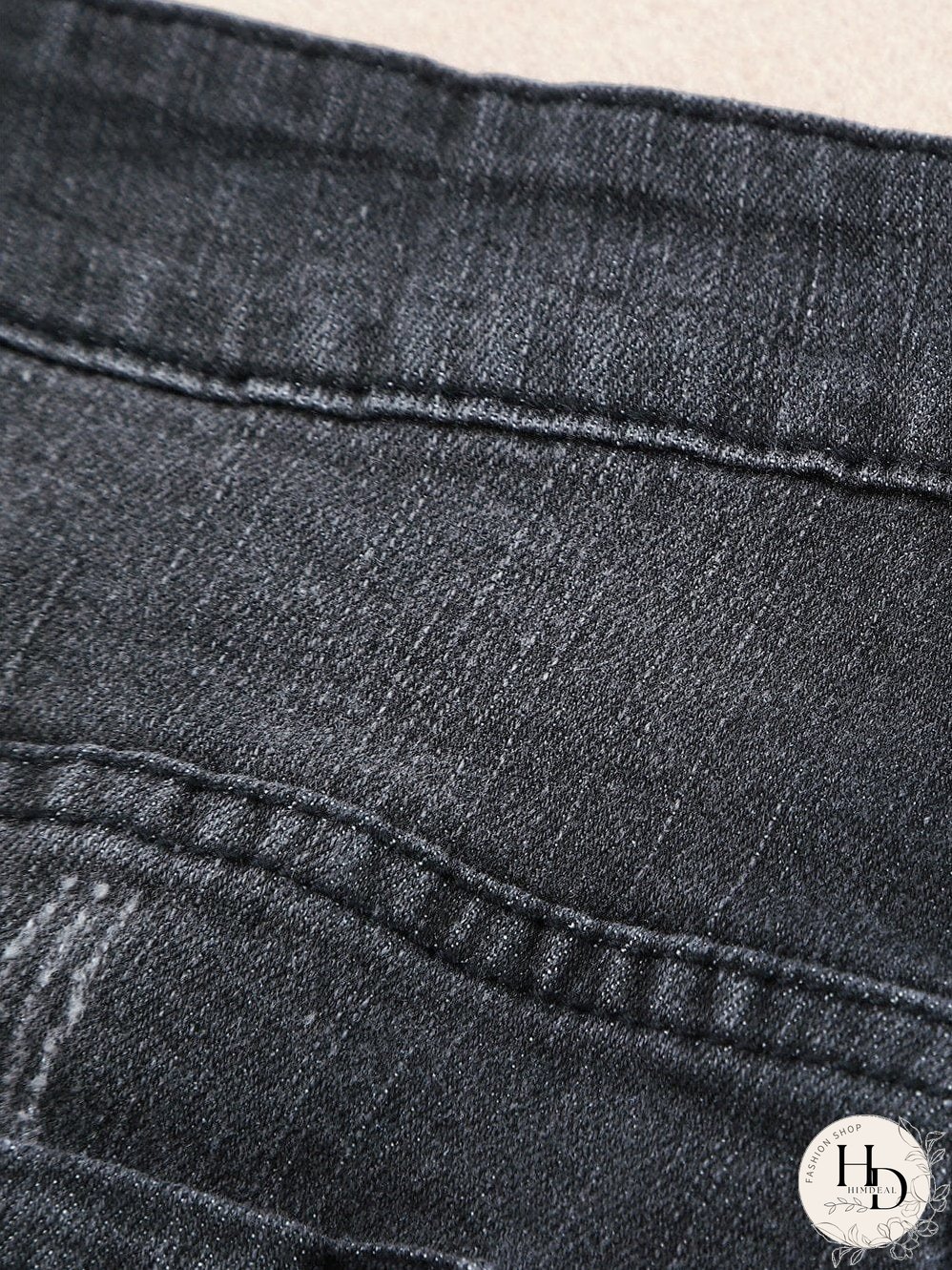 Vintage Chic Distressed Black Denim Shorts with Roll Hem