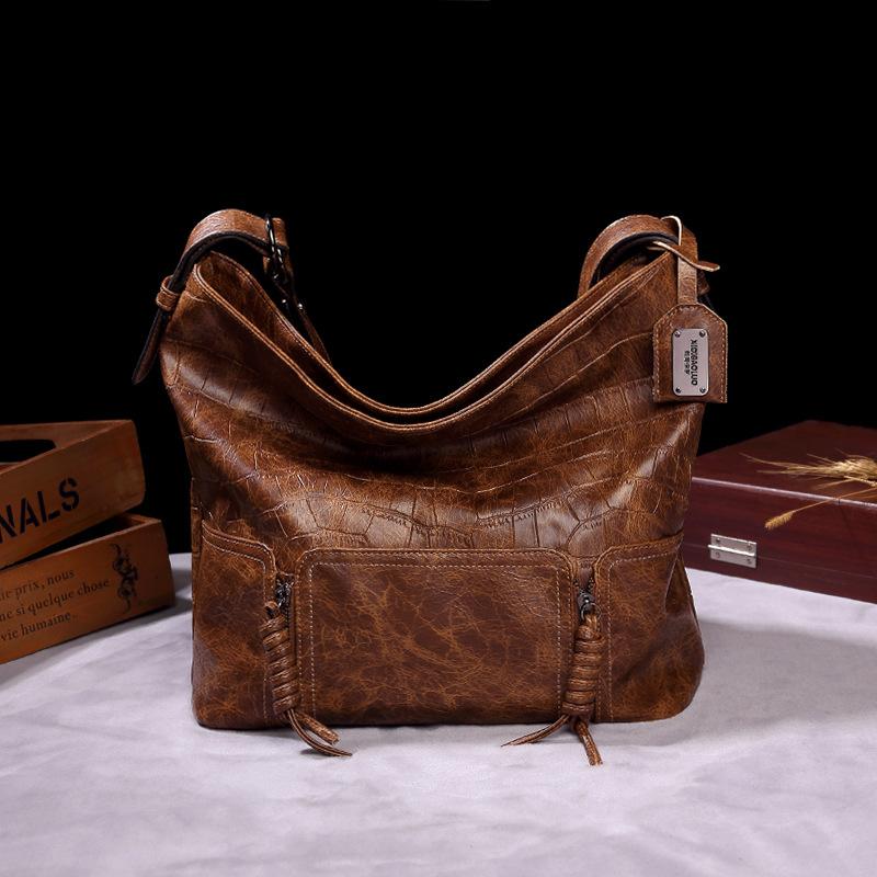 Vintage brand style single shoulder cross-arm capacity women's bag