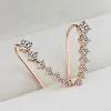 Clous d'oreilles diamant sept &eacute;toiles