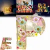 Veilleuse LED avec lettres imprim&eacute;es de fleurs s&eacute;ch&eacute;es en r&eacute;sine