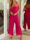 Spaghetti-Neck Falbala Backless Solid Color Casual Jumpsuit