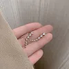 Clous d'oreilles diamant sept &eacute;toiles