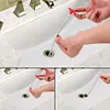 Outil de Ramassage Flexible &agrave; Griffe Pr&eacute;hensile pour &Eacute;gout